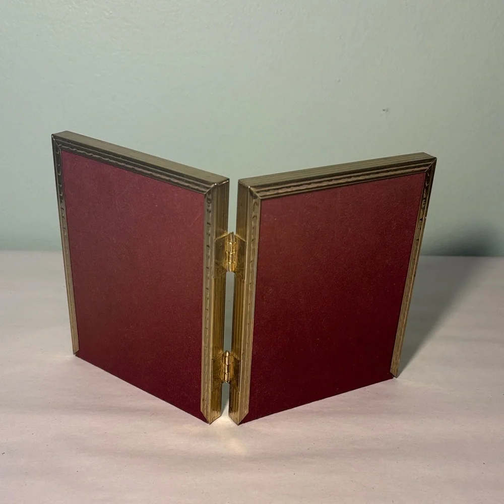 Gold Tone Bi-Fold Double Picture Frame with 6 Mats
